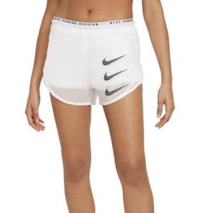 Nike Brand running shorts with spandex lining. White. Size medium. Like new.